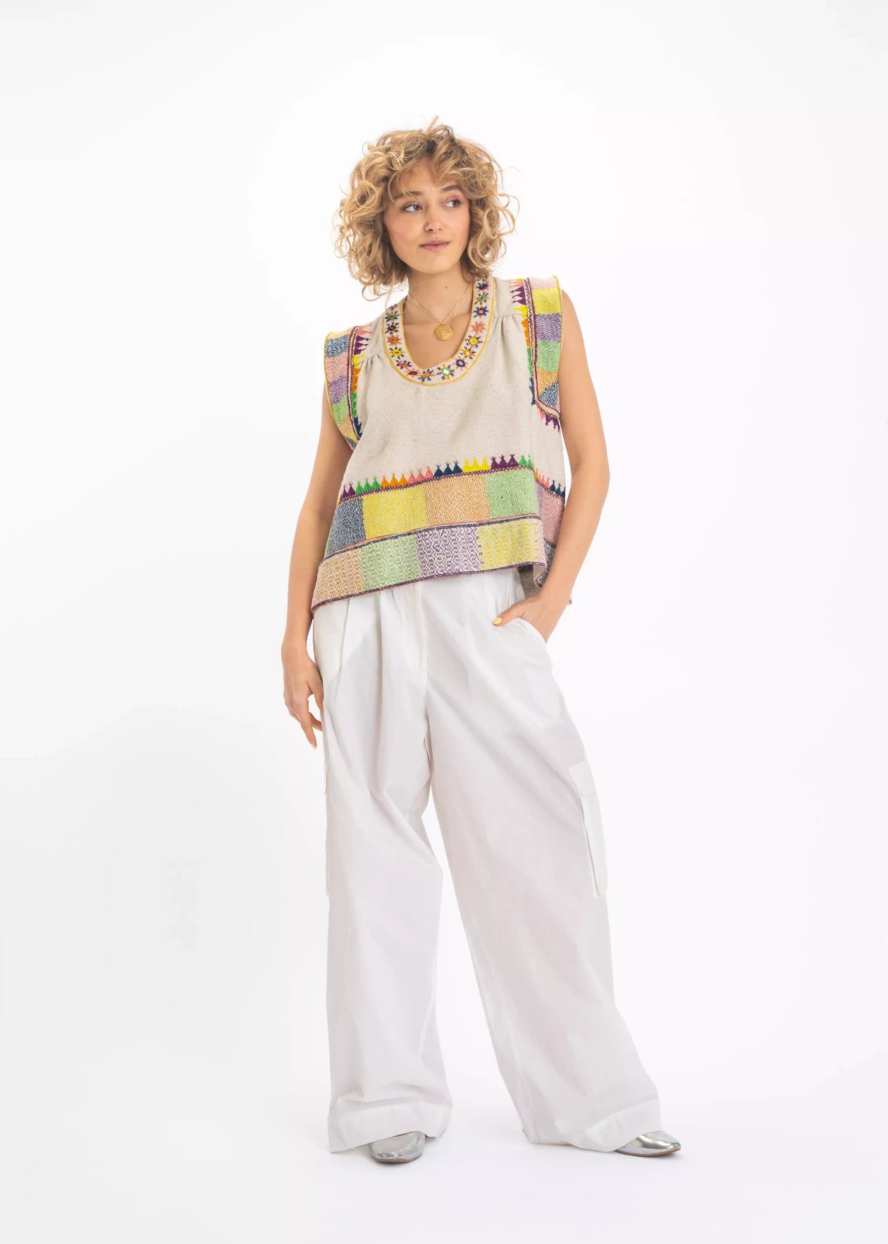 top brodée Saraswati v de vinster